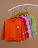 بلوز دخترانه کشبافت ضربدری بابونه - Image 16